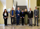 Gruppenfoto im Treppenhaus: Cornelia Thum, Claus Belka, Innenminister Joachim Herrmann, Dr. Mandy Wahlbuhl-Becker, Rebekka Kiser und Dr. Georg Münzenrieder